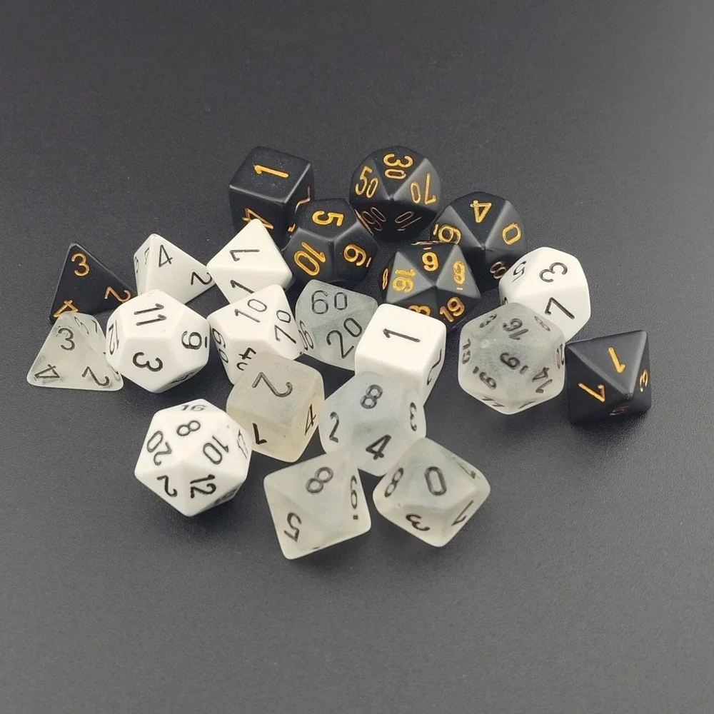 Chessex dice black gold white translucent game play RPG role hexagon triangle